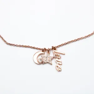 Alicia Bonnie Sparkling Clear Crystals Rose Gold star and moon Necklace