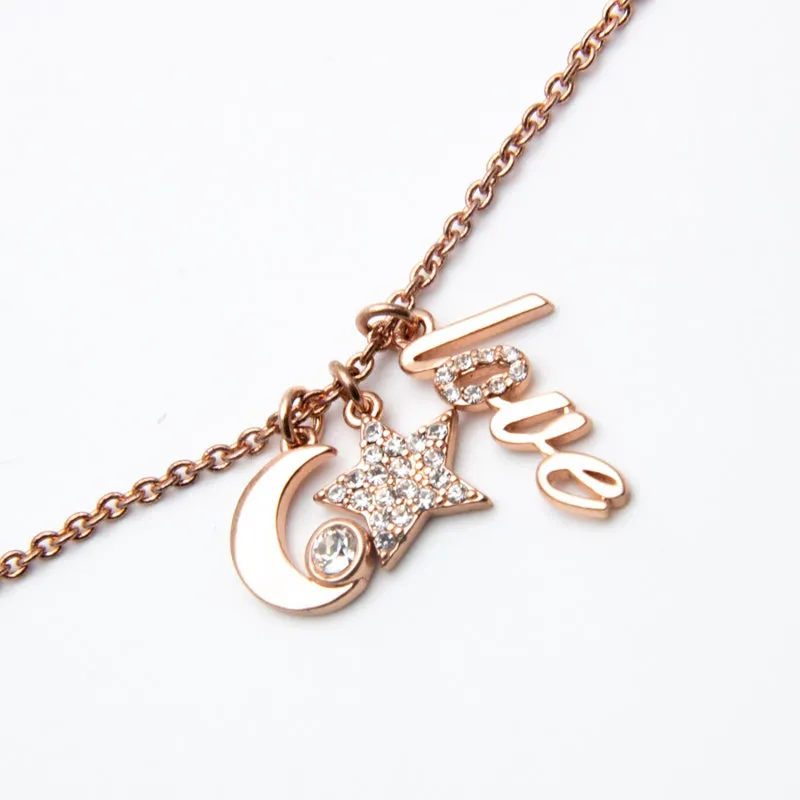 Alicia Bonnie Sparkling Clear Crystals Rose Gold star and moon Necklace
