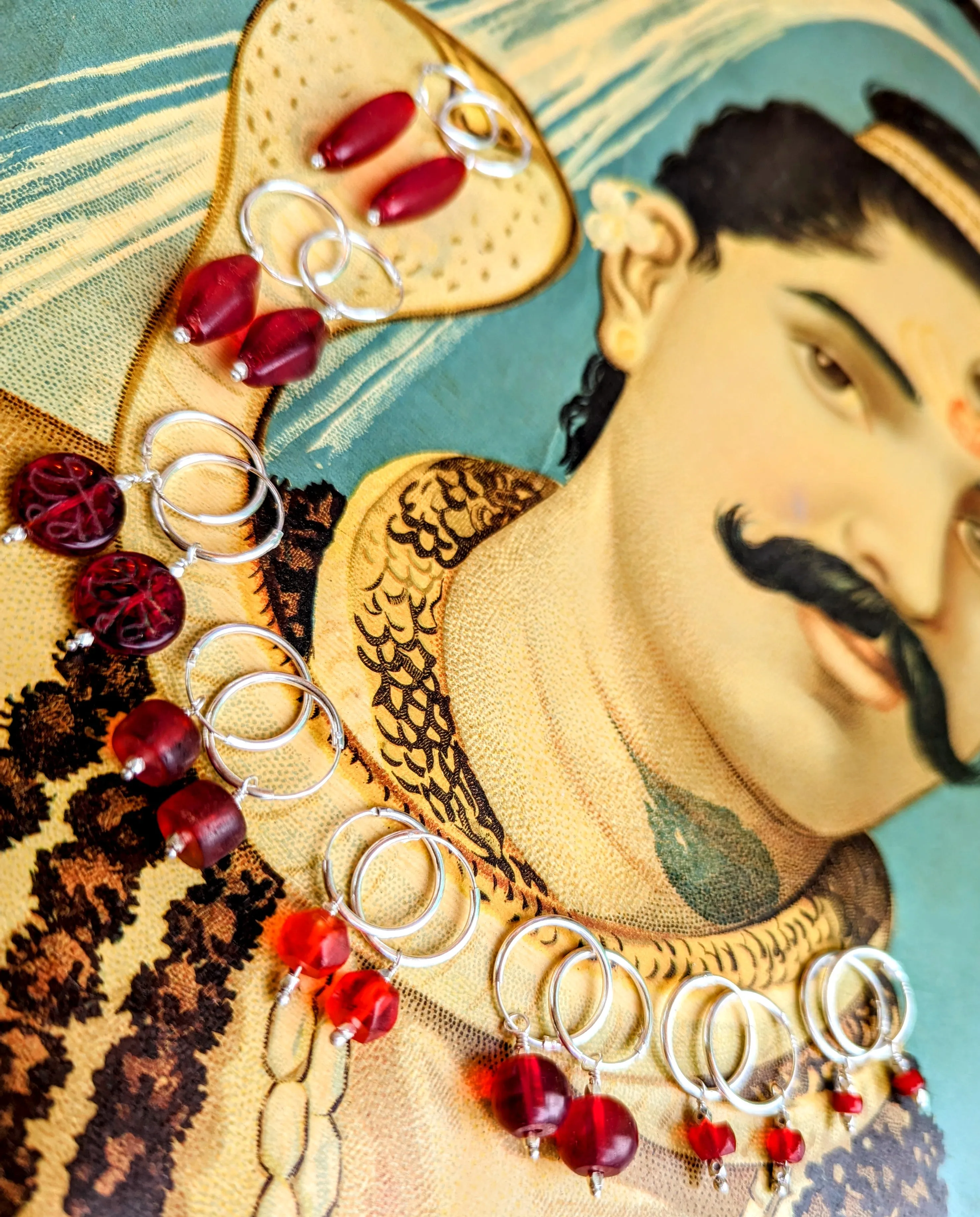 Antique red trade bead hoops