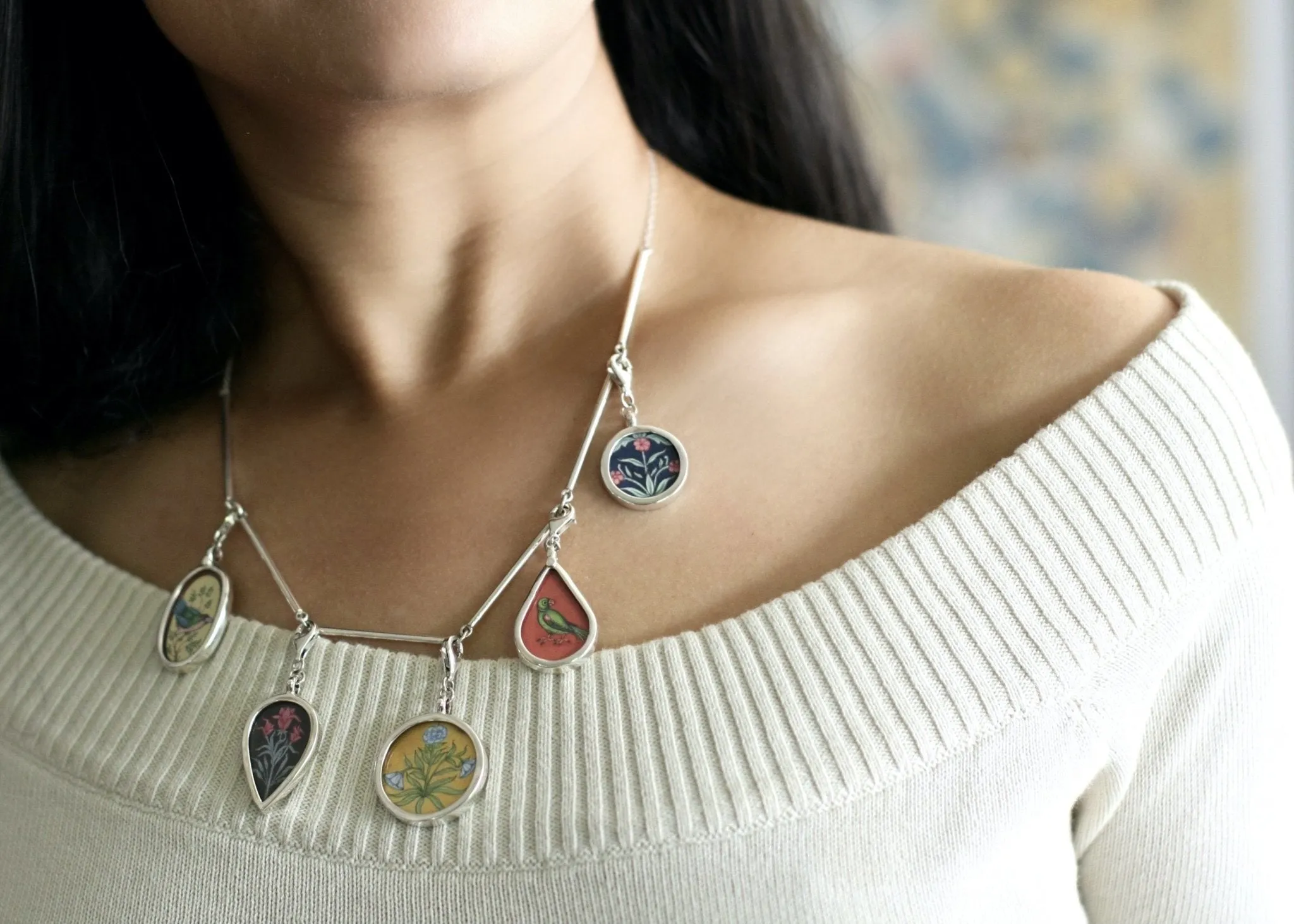 Dramatic, conversation-starting, linked necklace with miniature painting pendants