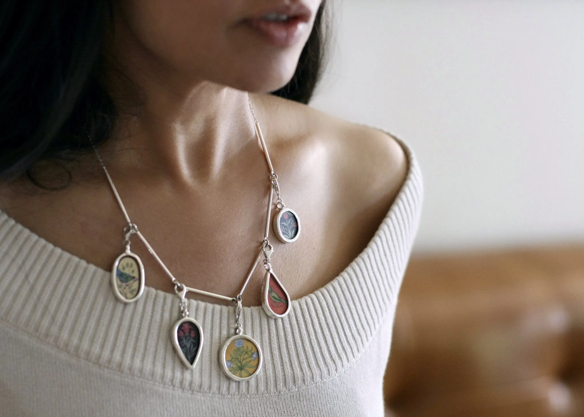 Dramatic, conversation-starting, linked necklace with miniature painting pendants