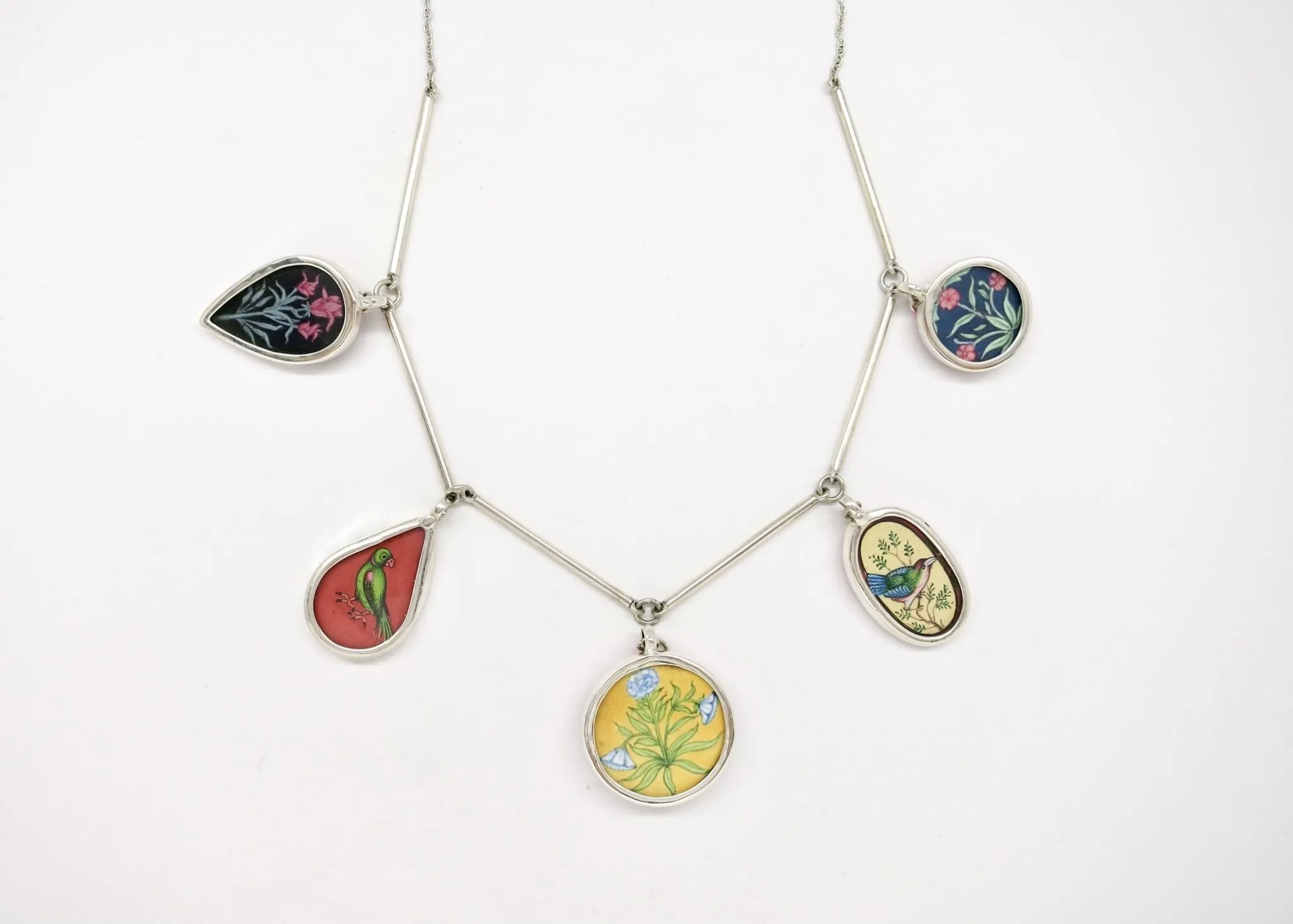 Dramatic, conversation-starting, linked necklace with miniature painting pendants