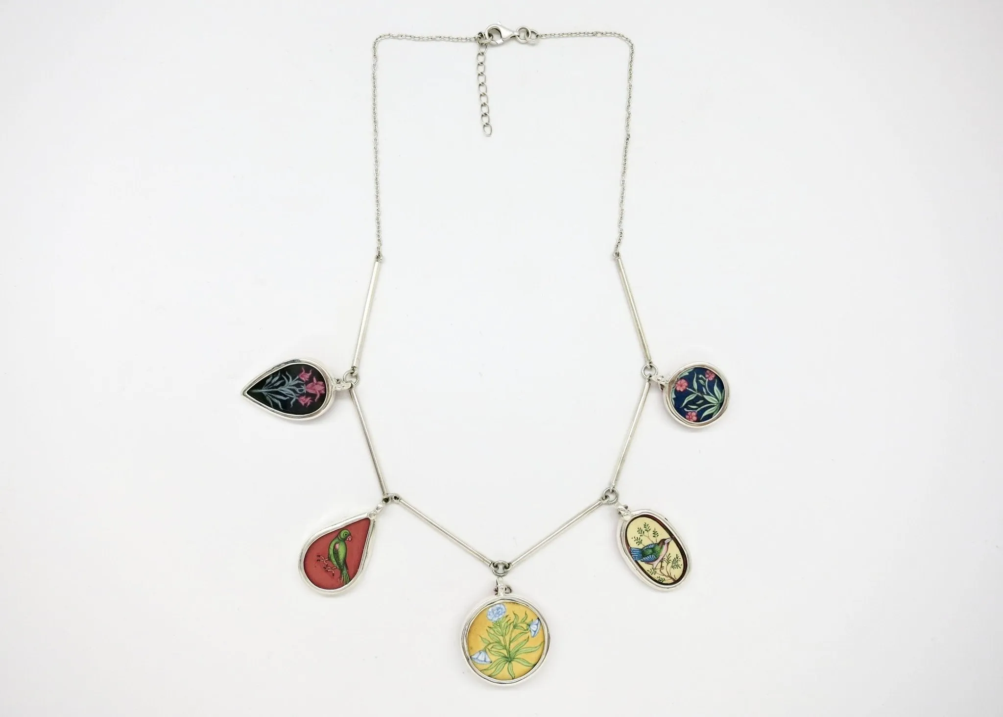 Dramatic, conversation-starting, linked necklace with miniature painting pendants