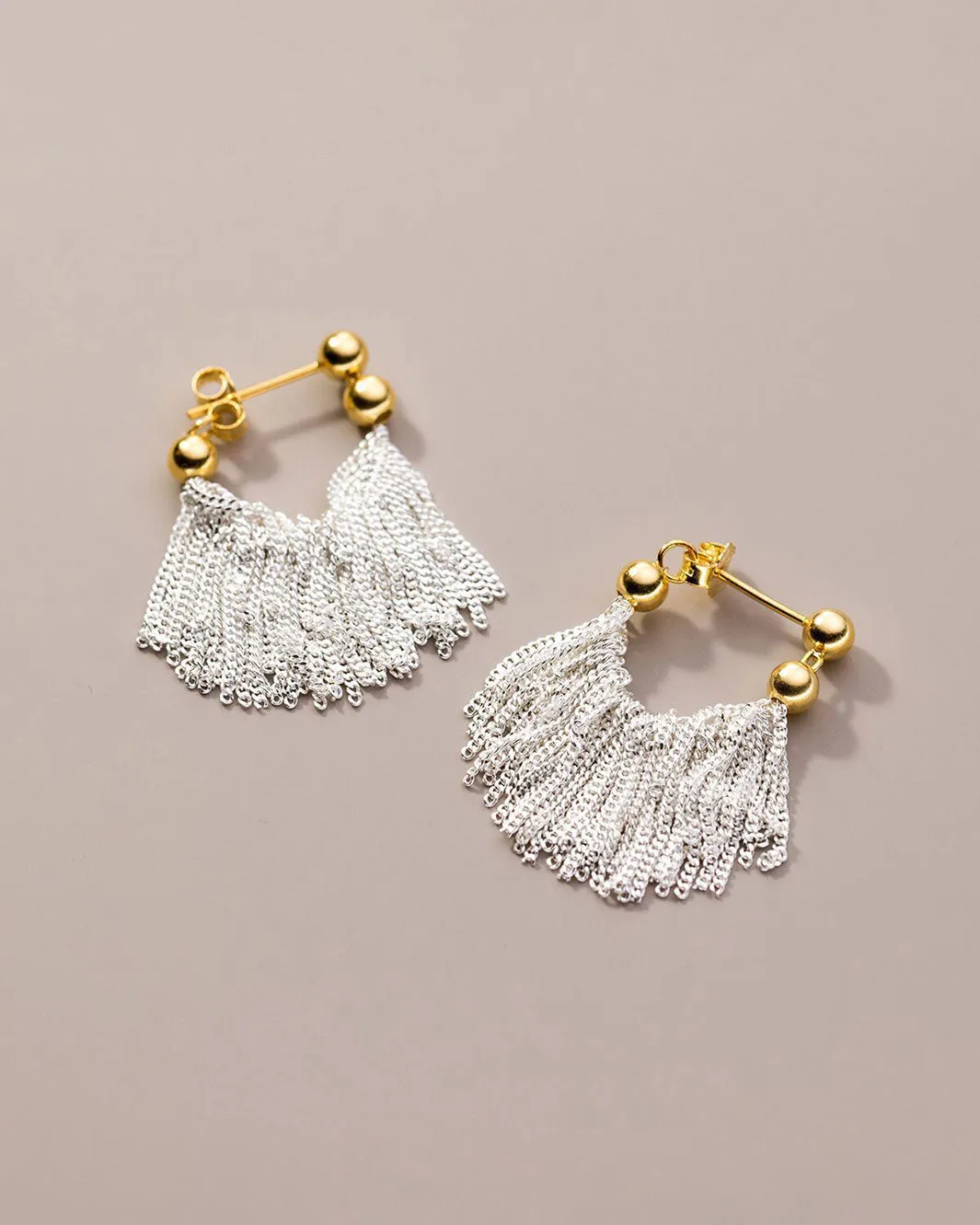 Dual Tone Gleaming Tassel Earrings