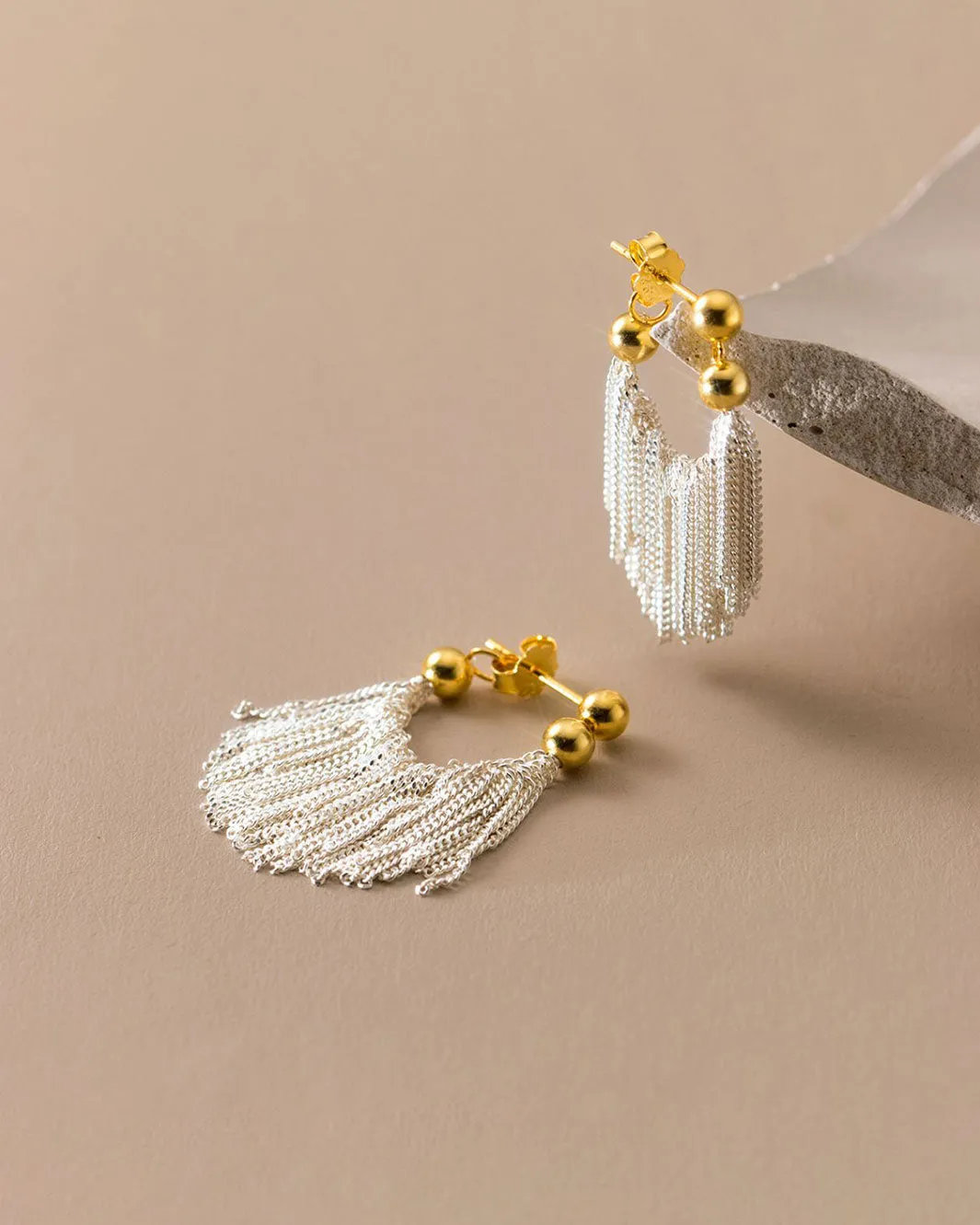 Dual Tone Gleaming Tassel Earrings