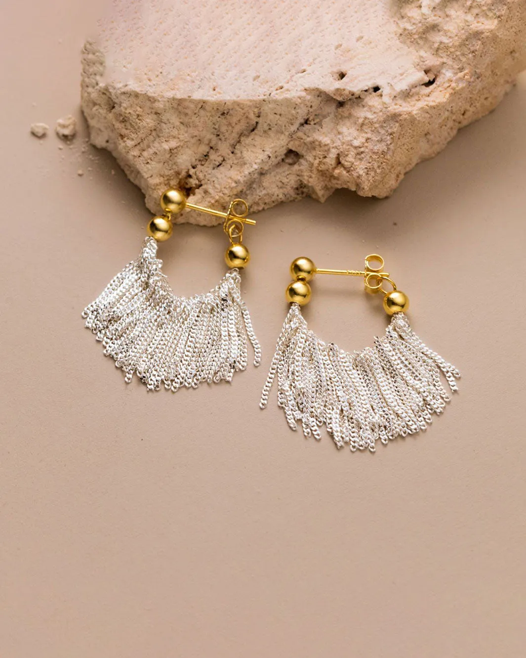 Dual Tone Gleaming Tassel Earrings