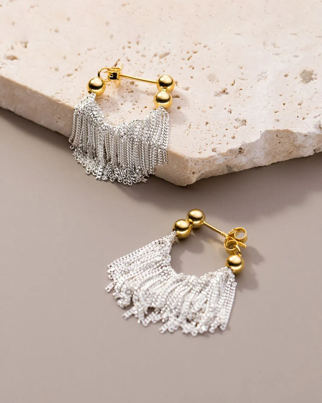 Dual Tone Gleaming Tassel Earrings