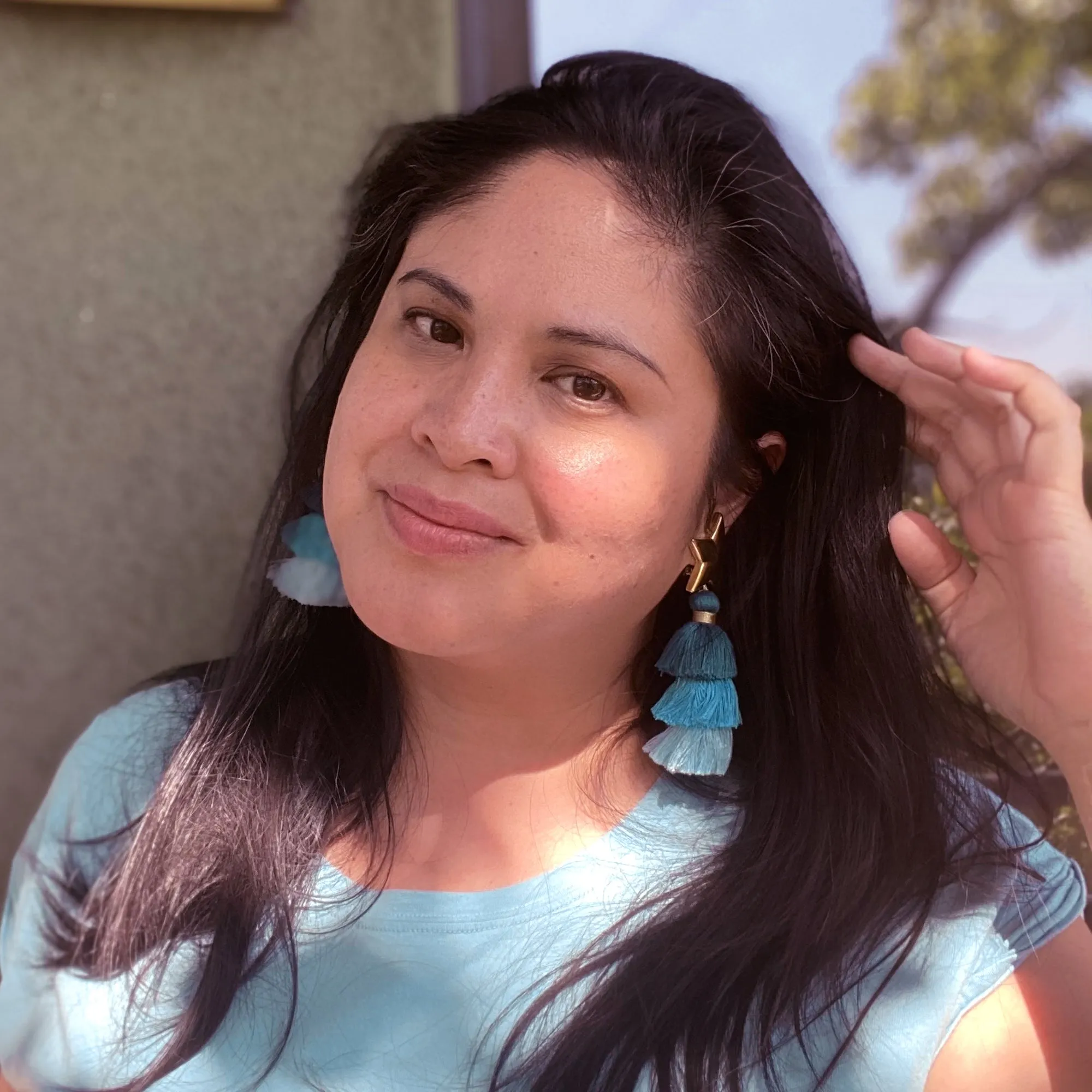 Gold star and teal tassel earrings