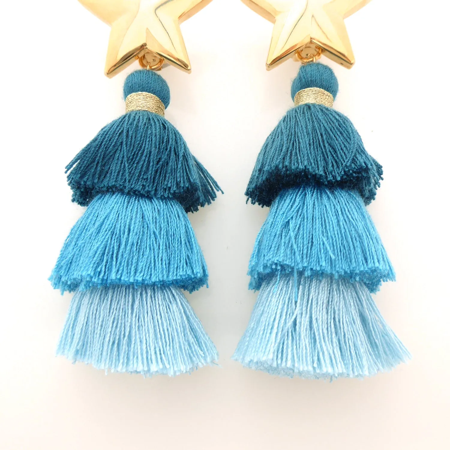Gold star and teal tassel earrings