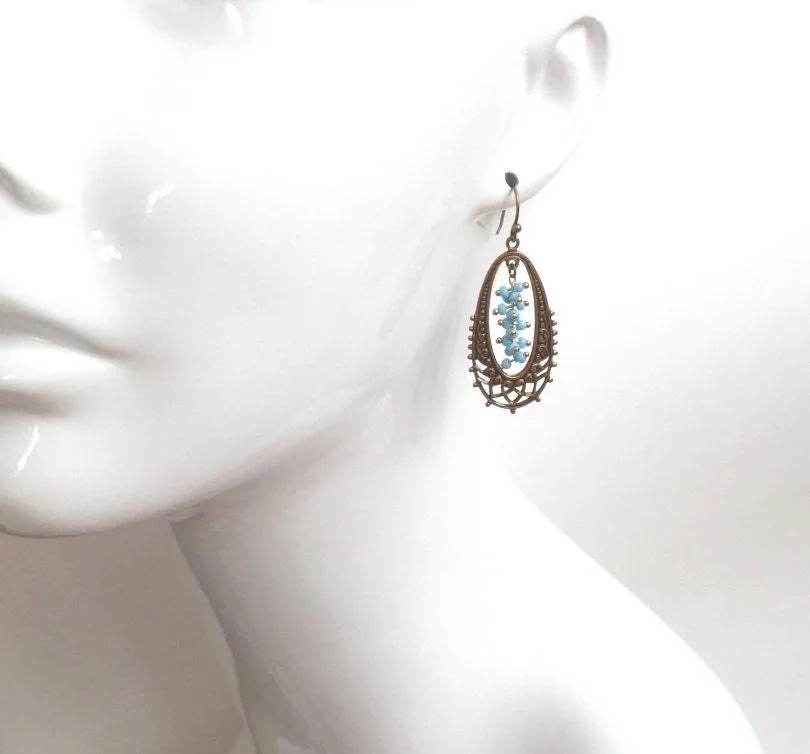 Long Oval Earrings - elongated lacy filigree in antique brass/bronze with tiny blue bead cluster center - fancy decorative boho