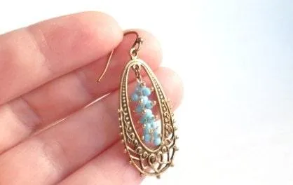 Long Oval Earrings - elongated lacy filigree in antique brass/bronze with tiny blue bead cluster center - fancy decorative boho