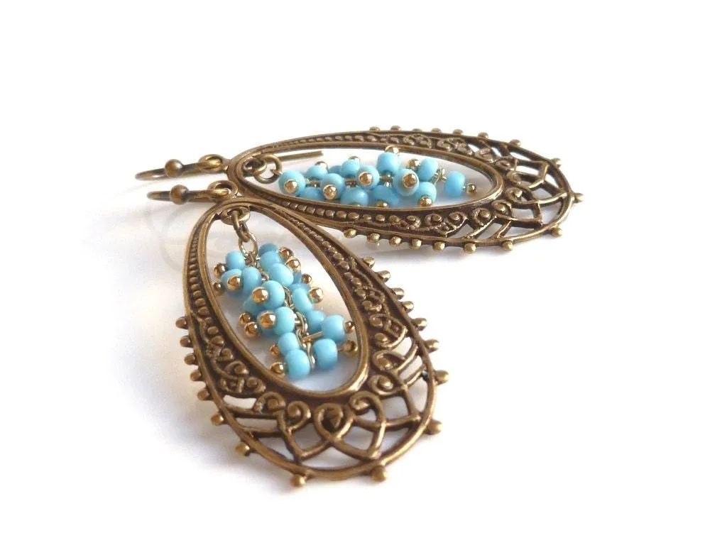 Long Oval Earrings - elongated lacy filigree in antique brass/bronze with tiny blue bead cluster center - fancy decorative boho