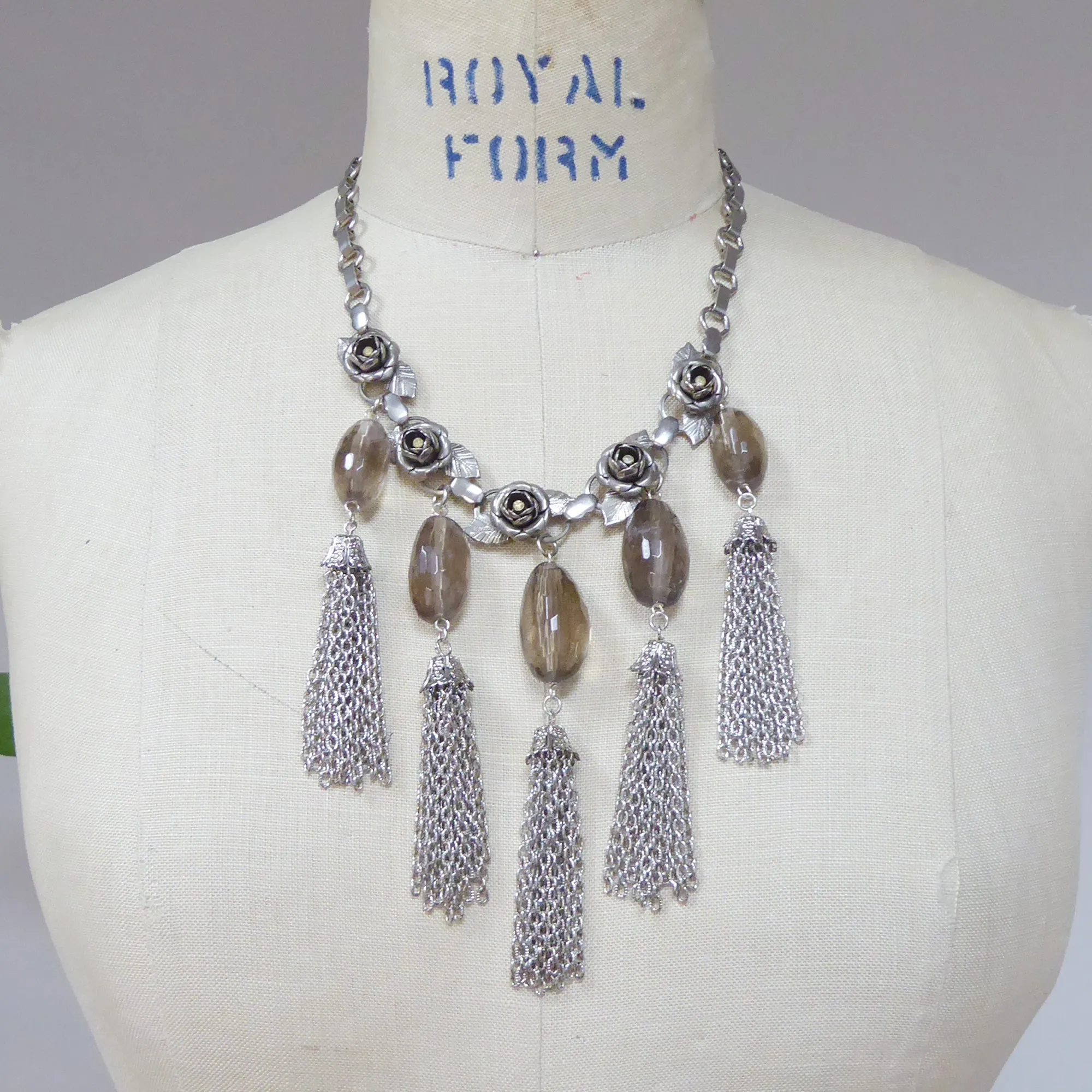 Silver rose tassel necklace