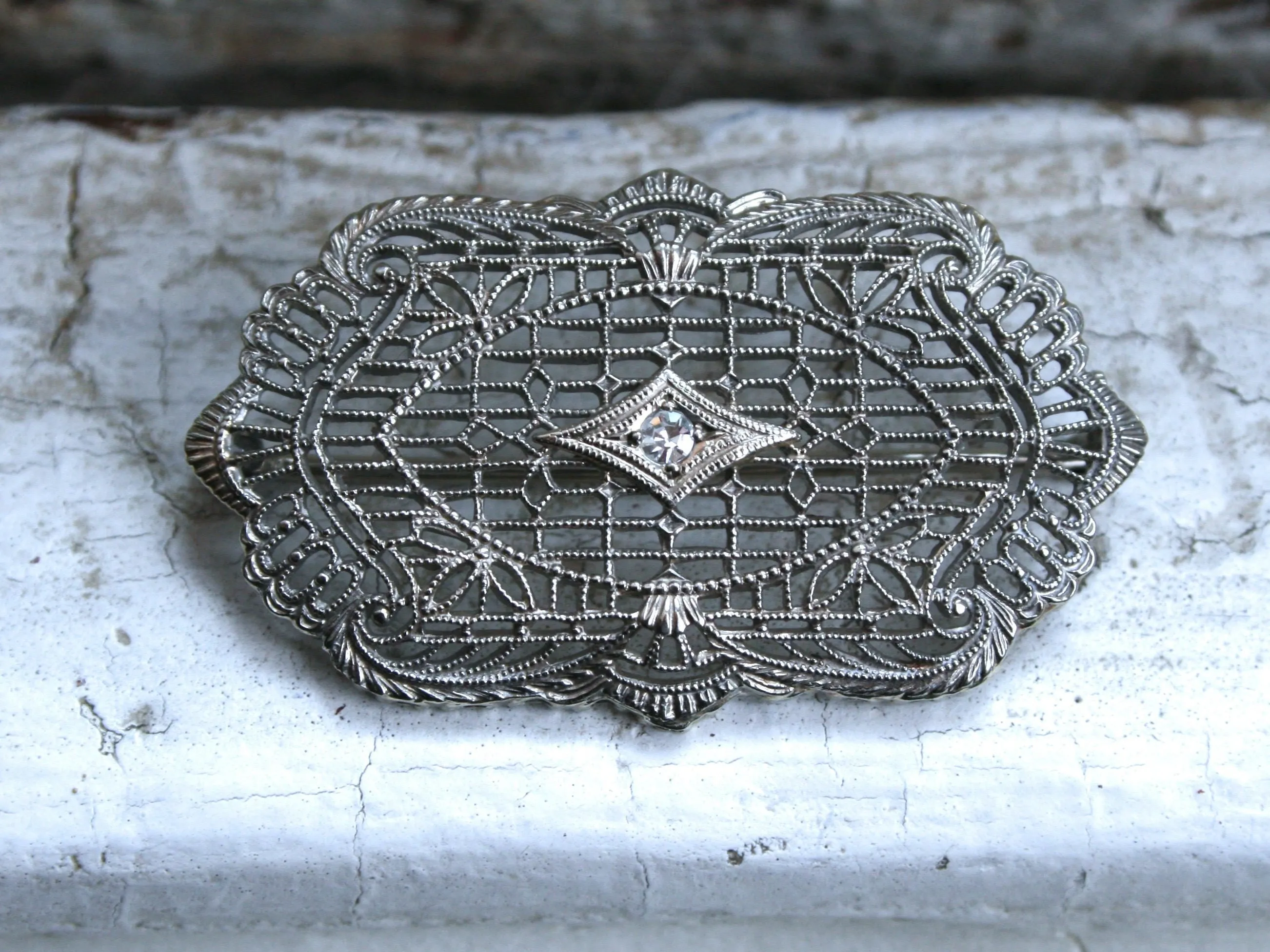 Vintage Filigree Diamond Pin/ Brooch in 10K White Gold.