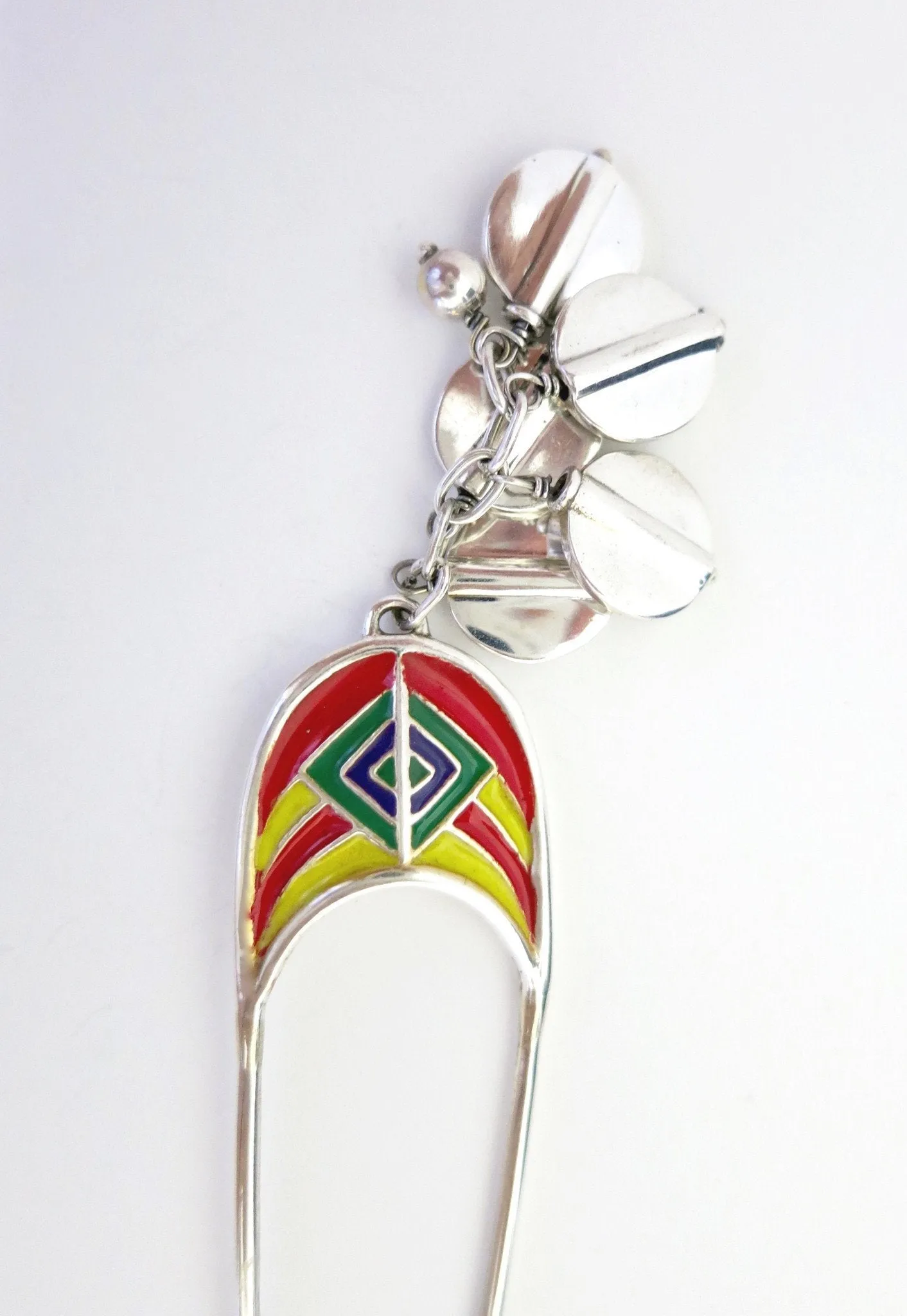 Whimsical, colorful, and artistic enamel-work bun stick
